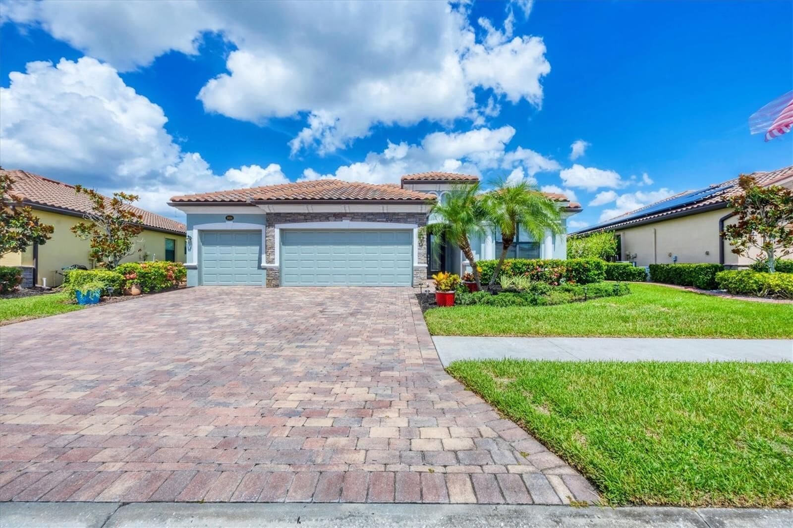 Paved driveway and two-car garage