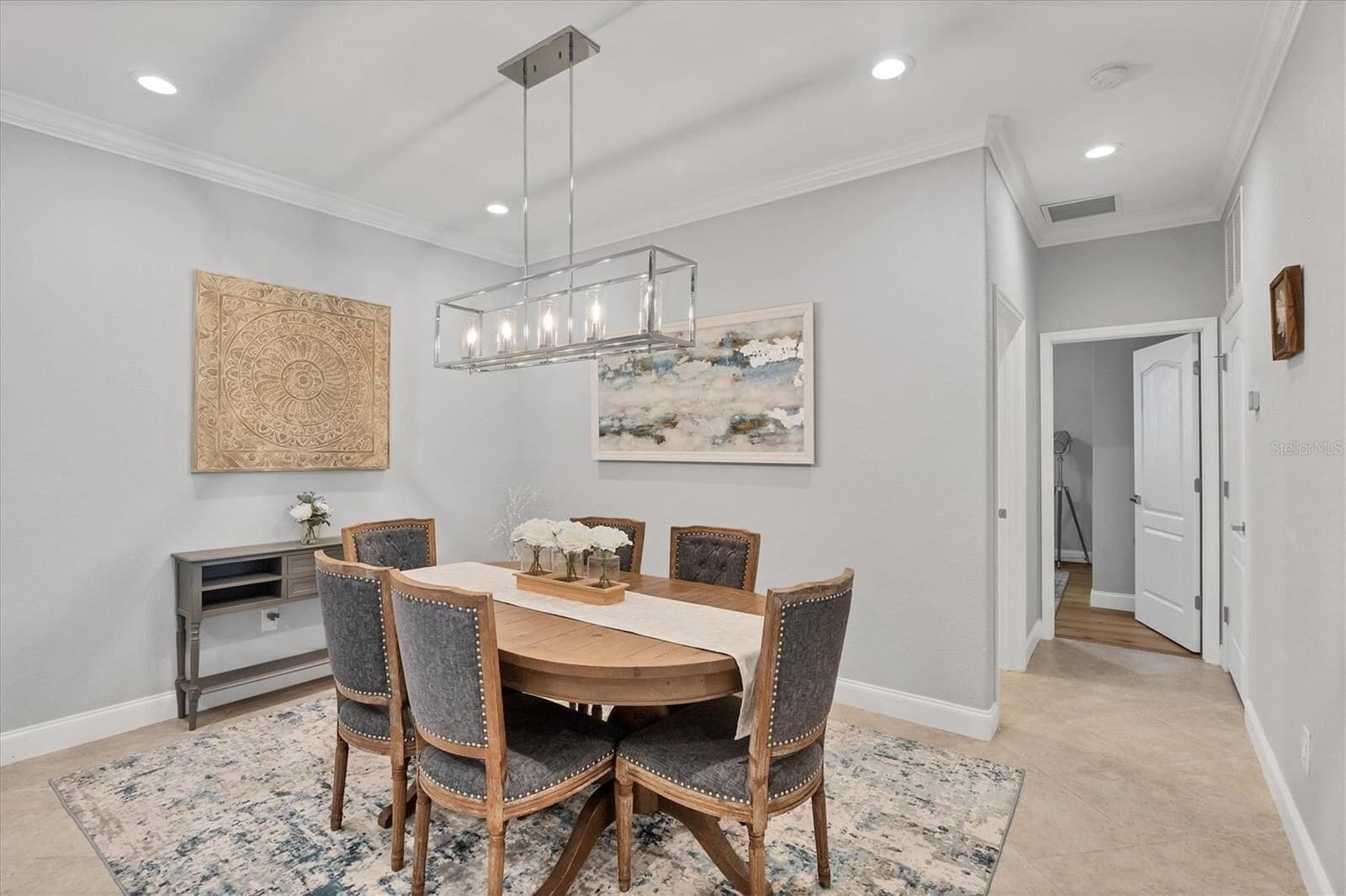Dining table with upholstered chairs