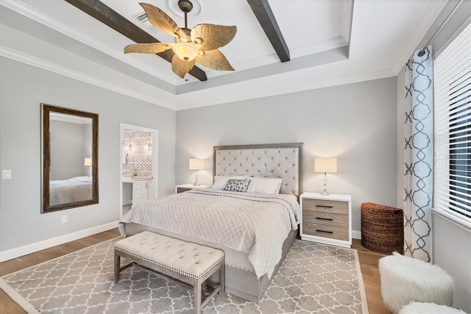 Bedroom with bedside tables and a bench