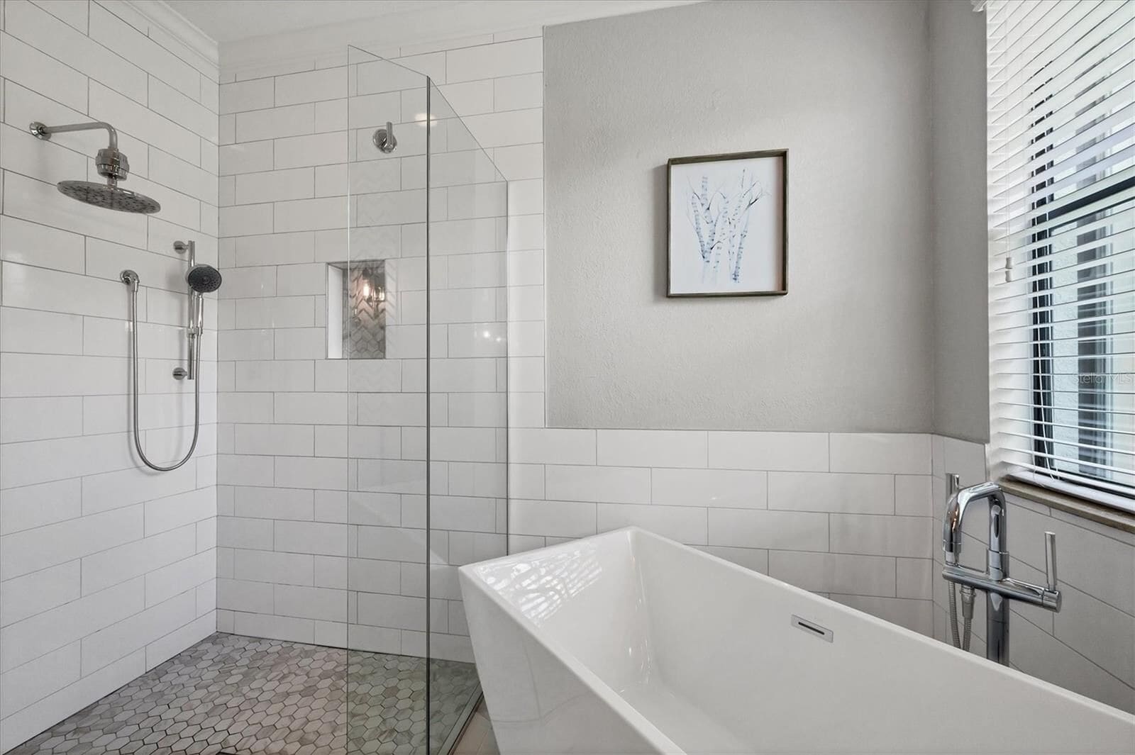 Second bathroom with glass-enclosed shower