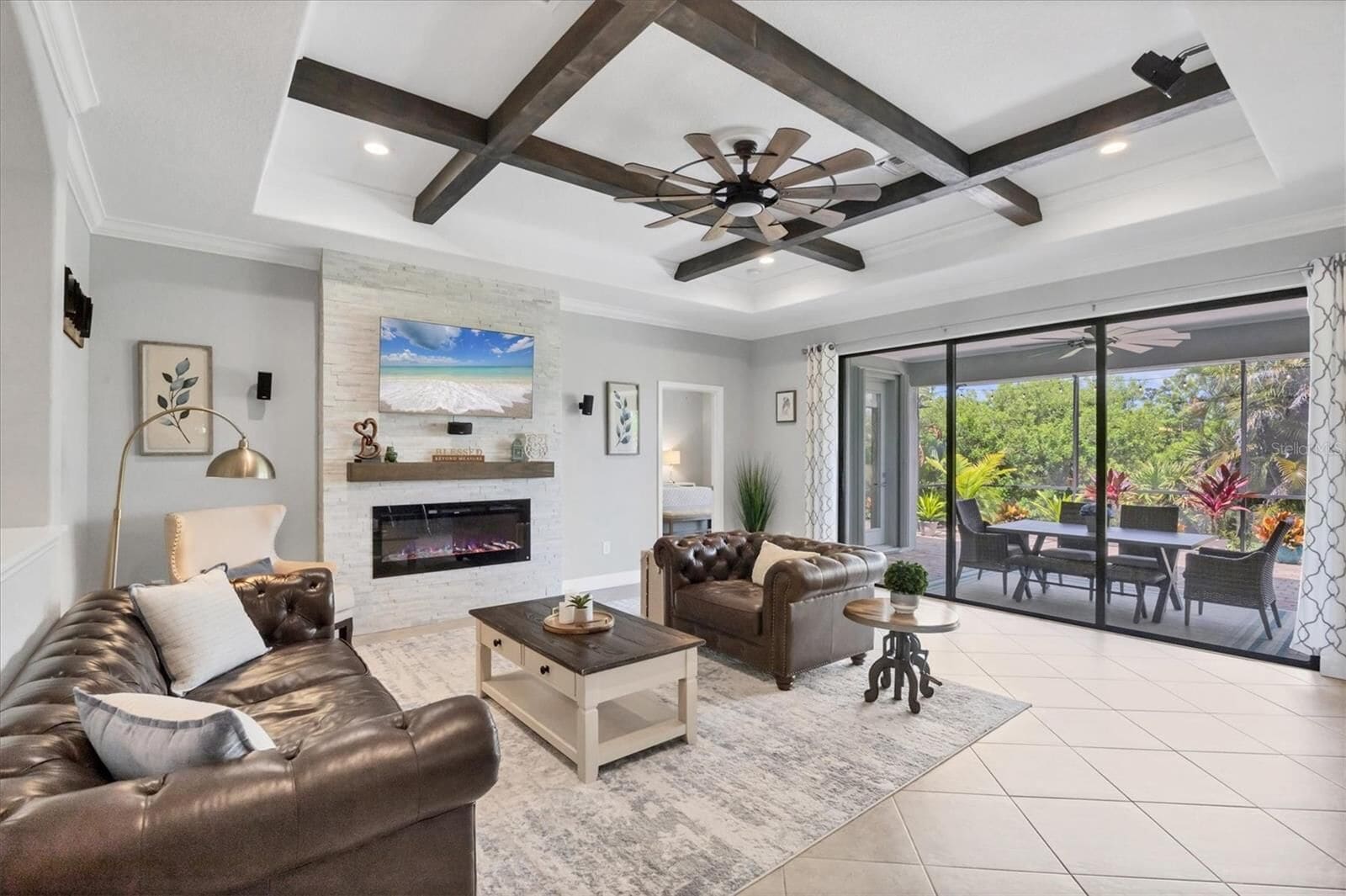 Clubhouse lounge with fireplace, opening onto the patio (shared)