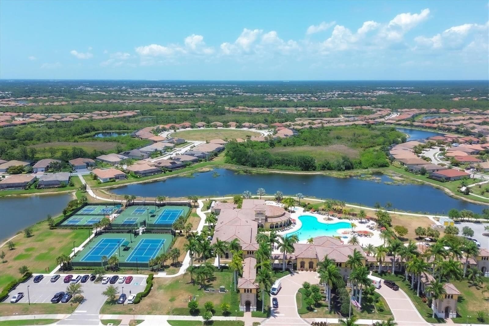 Gran Paradiso from the air — pool, tennis courts and lake