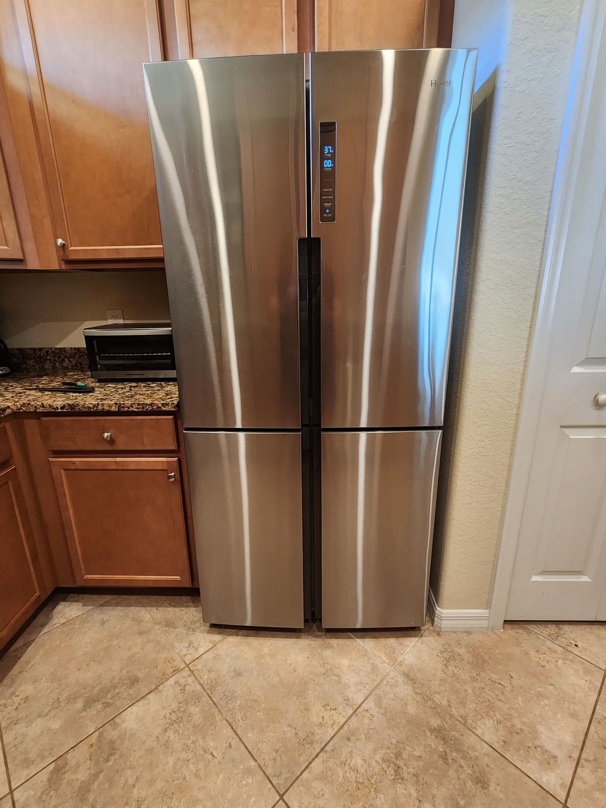 Full-size refrigerator with a filtered water dispenser