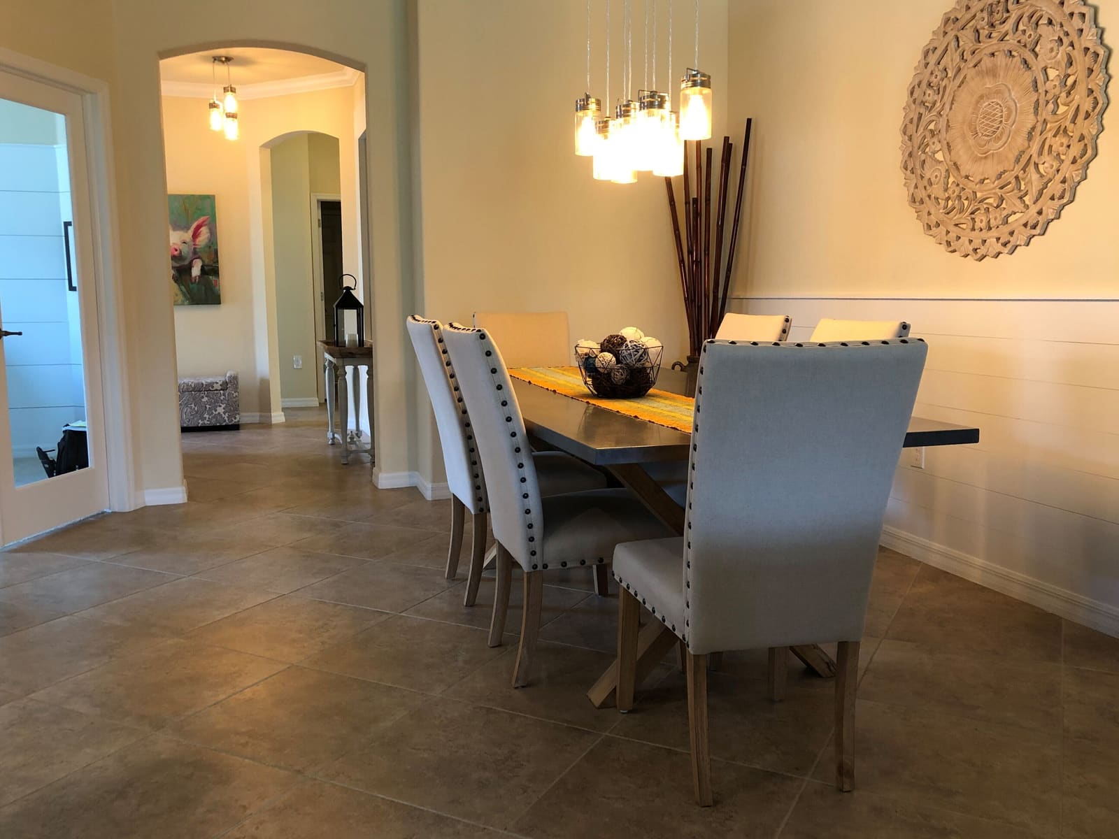 Dining table with upholstered chairs, seating six