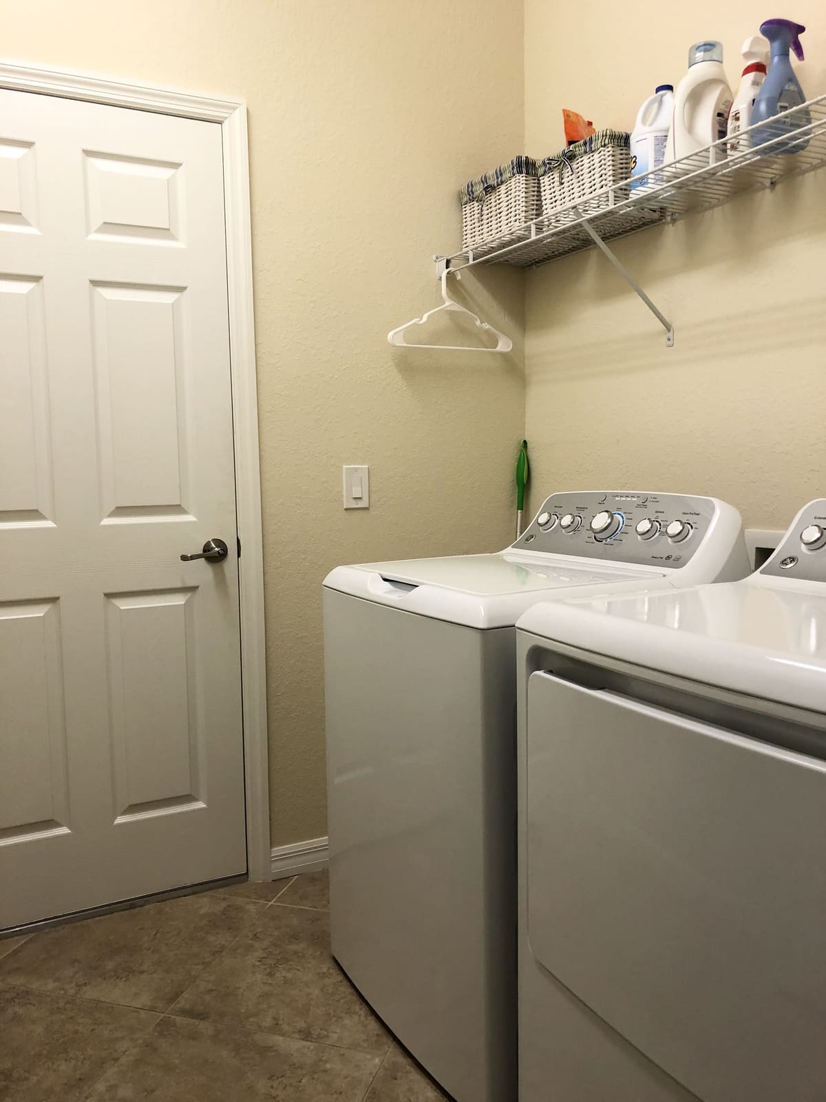 Laundry room with washing machine and dryer