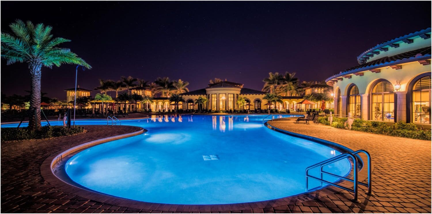 The community resort pool after dark (shared, not private)
