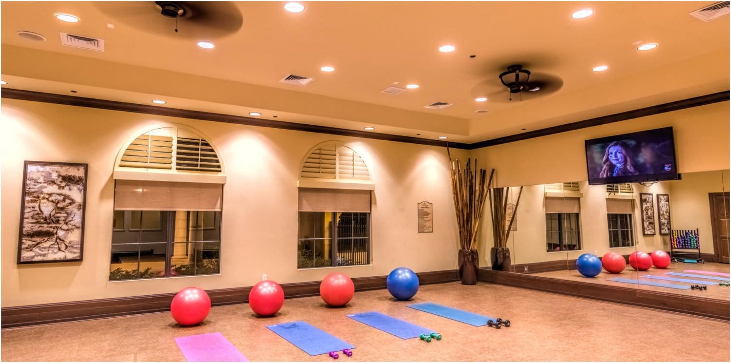 Community fitness studio with mats and exercise balls (shared)