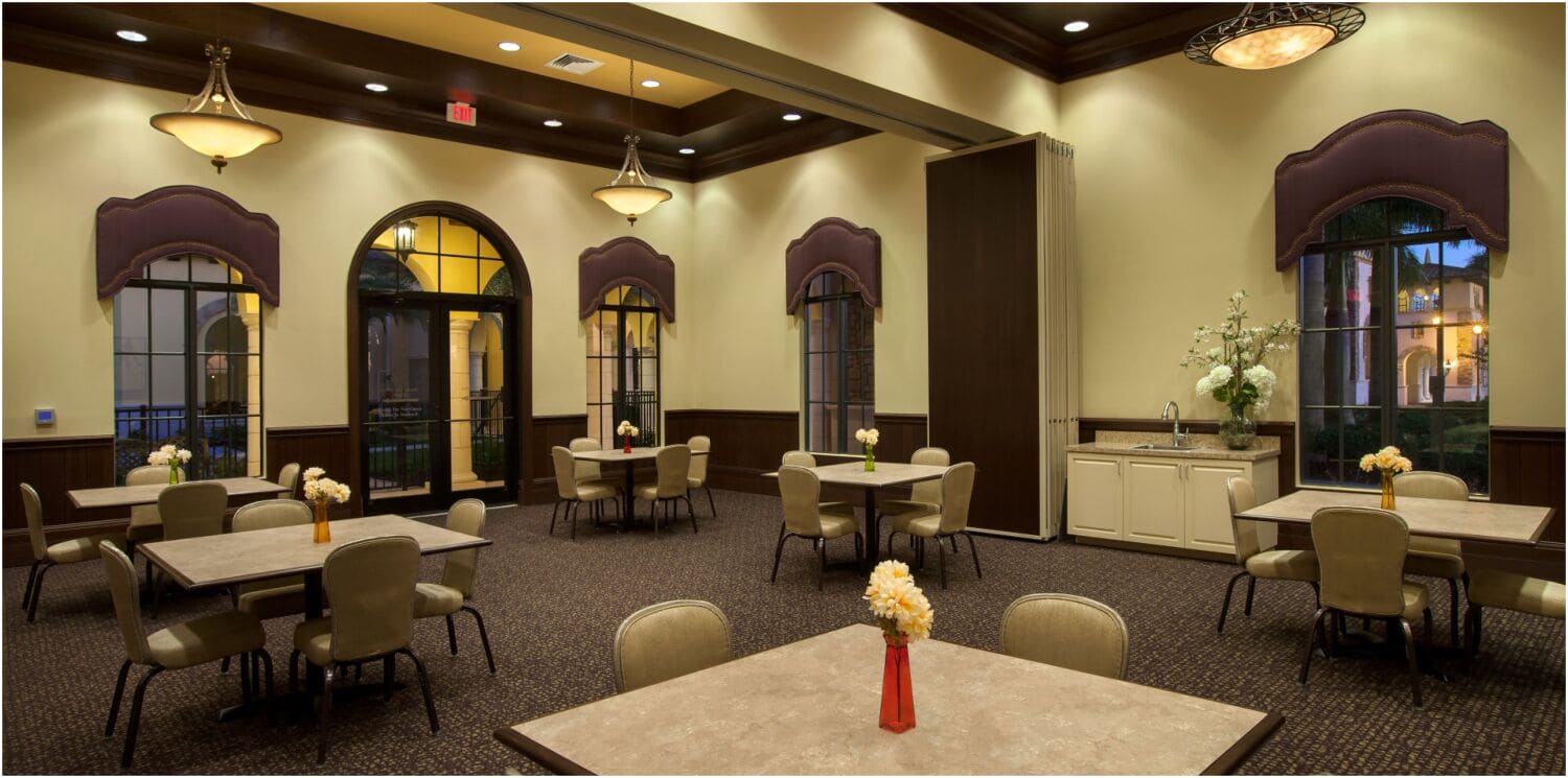 Clubhouse seating under arched windows (shared)